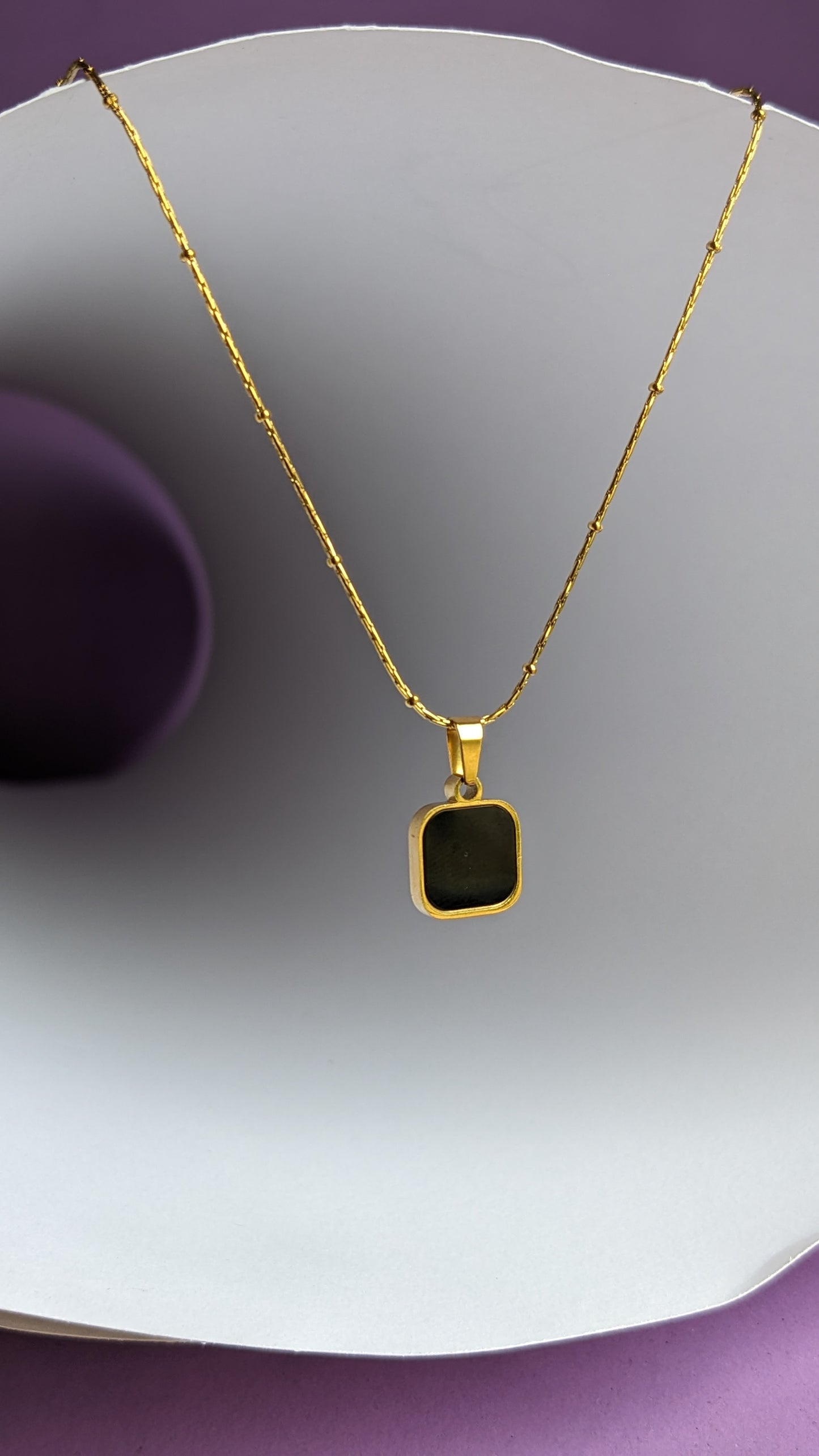 TWO SIDED BLACK SQUARE PENDANT