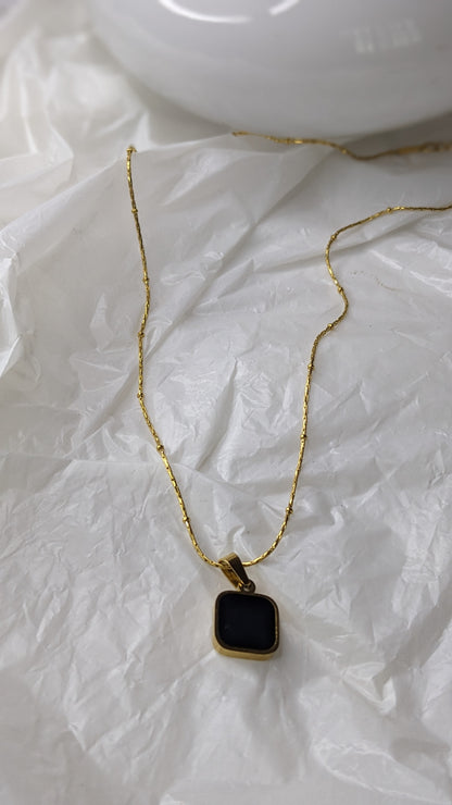 TWO SIDED BLACK SQUARE PENDANT